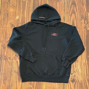 The North Face Black Hoodie with Red Logo